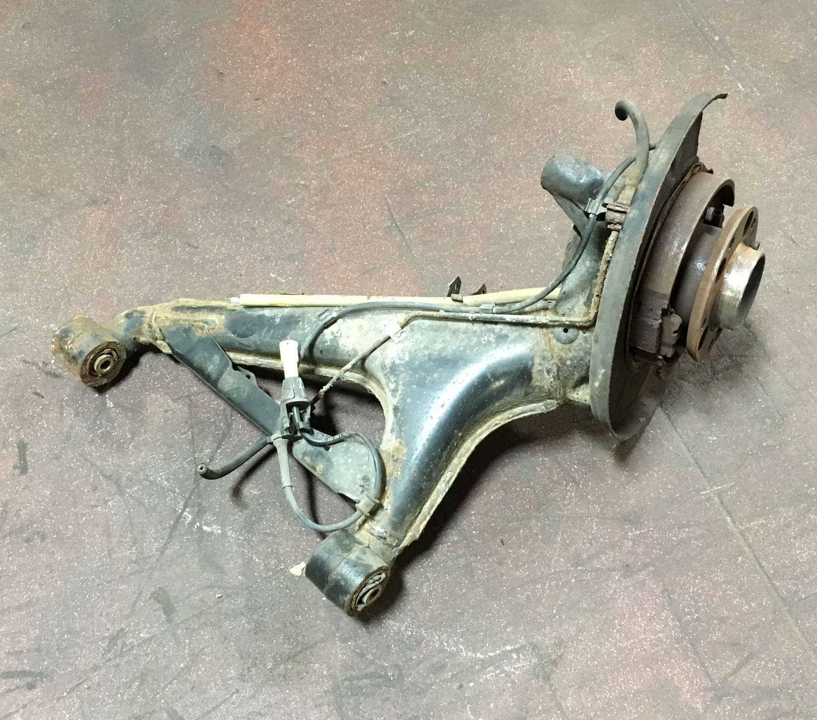 BMW E34 525i Left Rear Trailing Arm Control Carrier E24 M6 E28 E32 19871995 OEM eBay