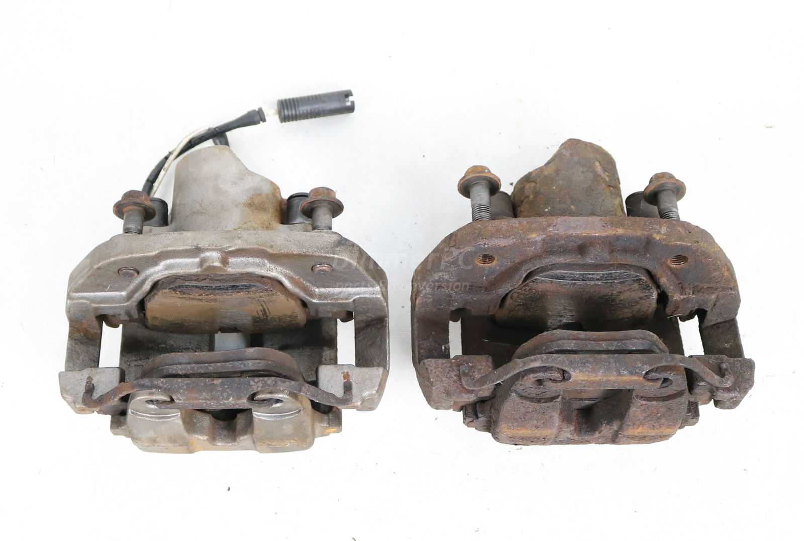 BMW E38 740iL Front Brakes Calipers Carriers Set E39 E53 X5 4.4i 1995